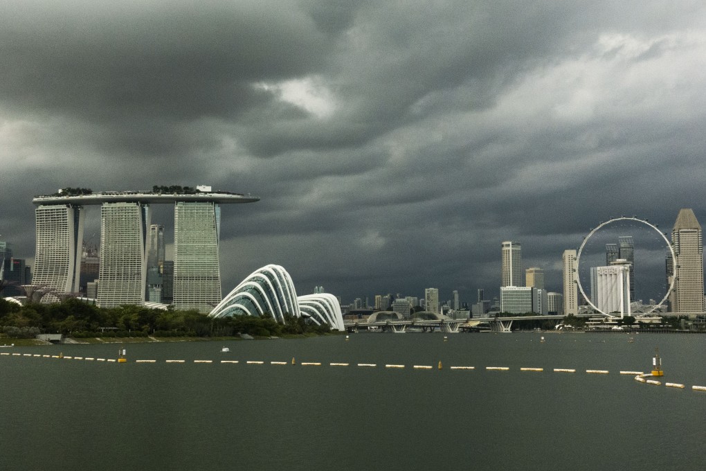 Dark clouds above Singapore’s skyline. Photo: Xinhua