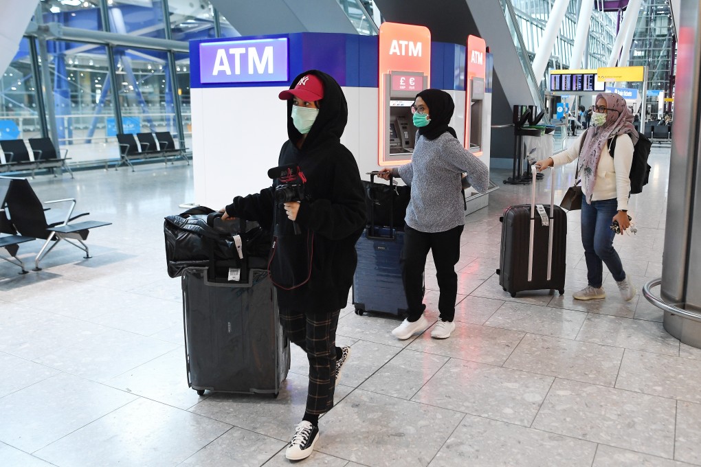 Travellers at London’s Heathrow Airport on Saturday. Tickets from the aviation hub to Hong Kong were being sold for more than HK$43,000 with Cathay Pacific. Photo: EPA