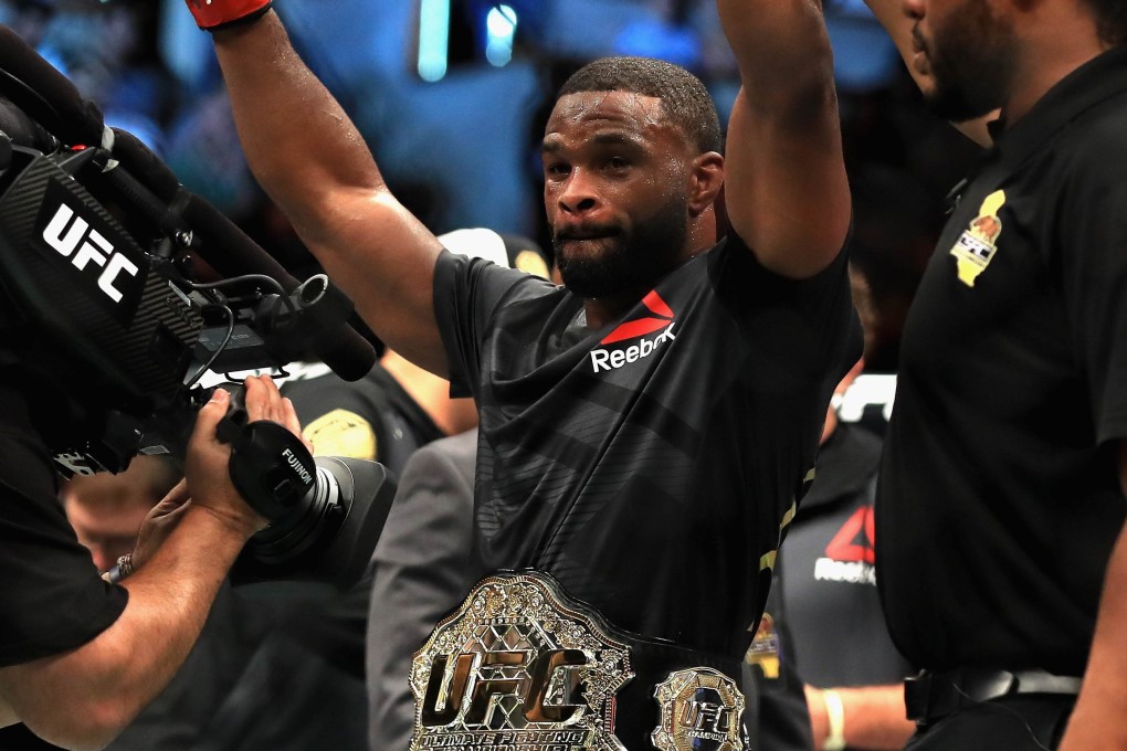 Tyron Woodley celebrates after defeating Demian Maia in a welterweight title defence at UFC 214 in 2017. Photo: AFP