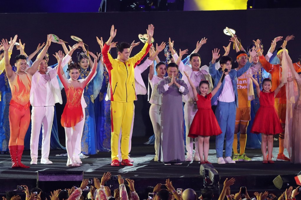Chinese swimmer Sun Yang with fellow Hangzhou native and Alibaba founder Jack Ma at the 2018 Jakarta Asian Games closing ceremony. Photo: Xinhua