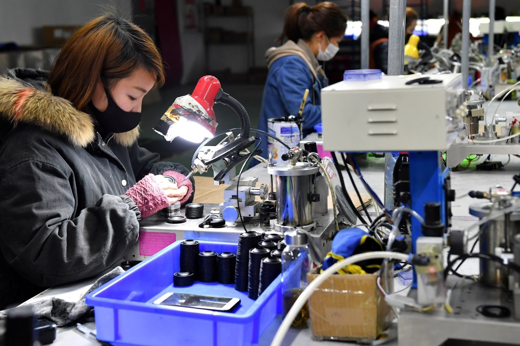 Amid a widespread shutdown of manufacturing operations, industrial production declined by 13.5 per cent over January and February, data showed. Photo: Xinhua