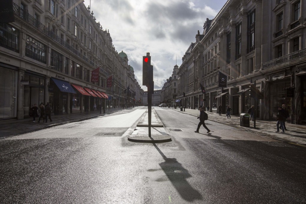 Shopping comes to a halt on London’s Regent Street, with few people out and about. Photo: AP
