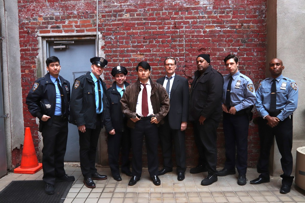 Ronny Chieng (centre) in a still from A Father's Son (2020). Photo: Lia Chang