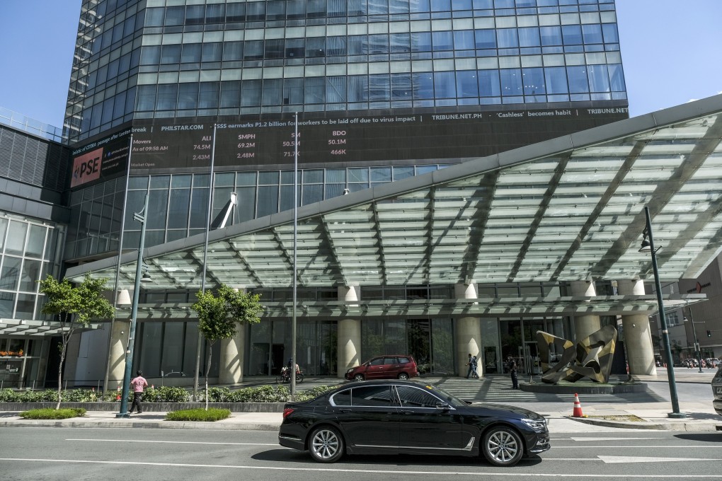 The Philippine Stock Exchange in Bonifacio Global City (BGC) in Metro Manila, has become the first in the world to close indefinitely in response to the coronavirus outbreak. This comes as a month-long lockdown of the Philippine capital took effect. Photo: Bloomberg