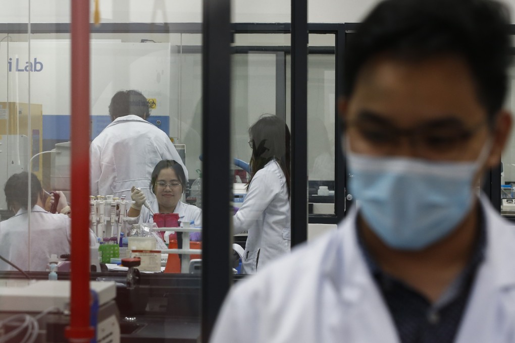Researchers work in a laboratory of the Philippine Genome Centre in Quezon City, Philippines, earlier this month. Photo: EPA