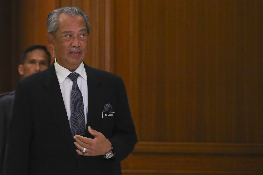 Malaysia’s Prime Minister Muhyiddin Yassin arrives for a press conference in Putrajaya, Malaysia. Photo: EPA