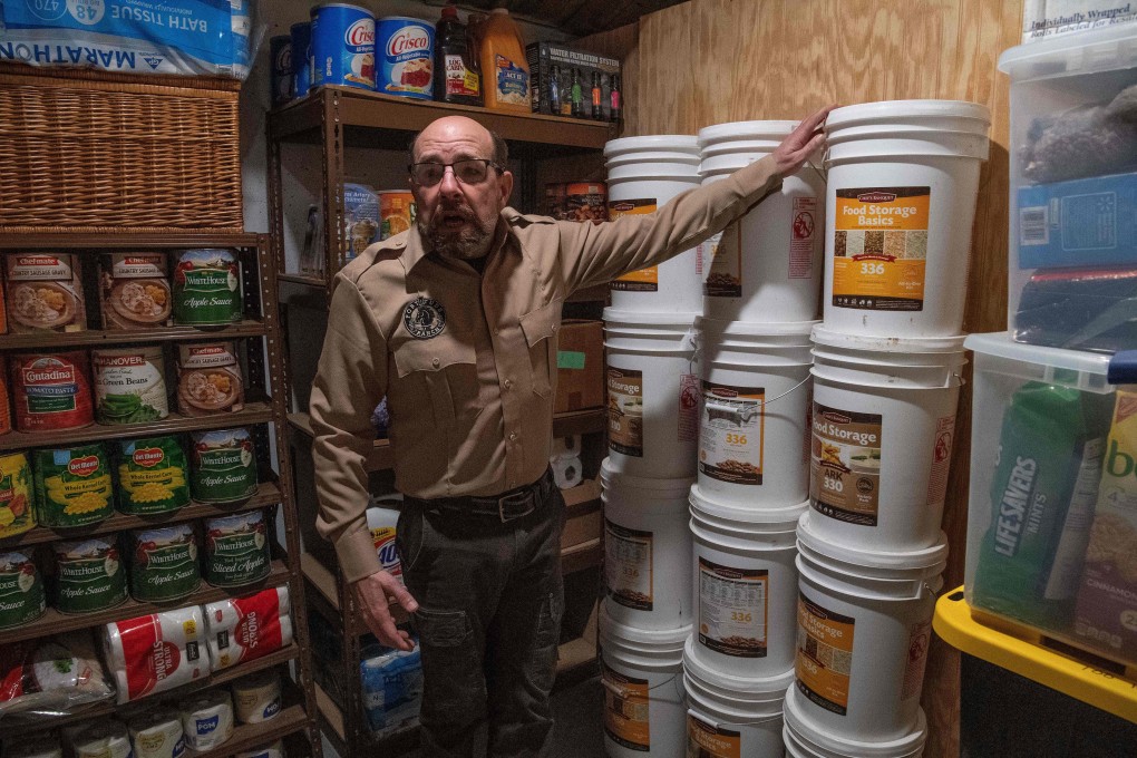 Fortitude Ranch Chief Operating Officer Steve Rene inside a storage room stacked with food. Photo: AFP