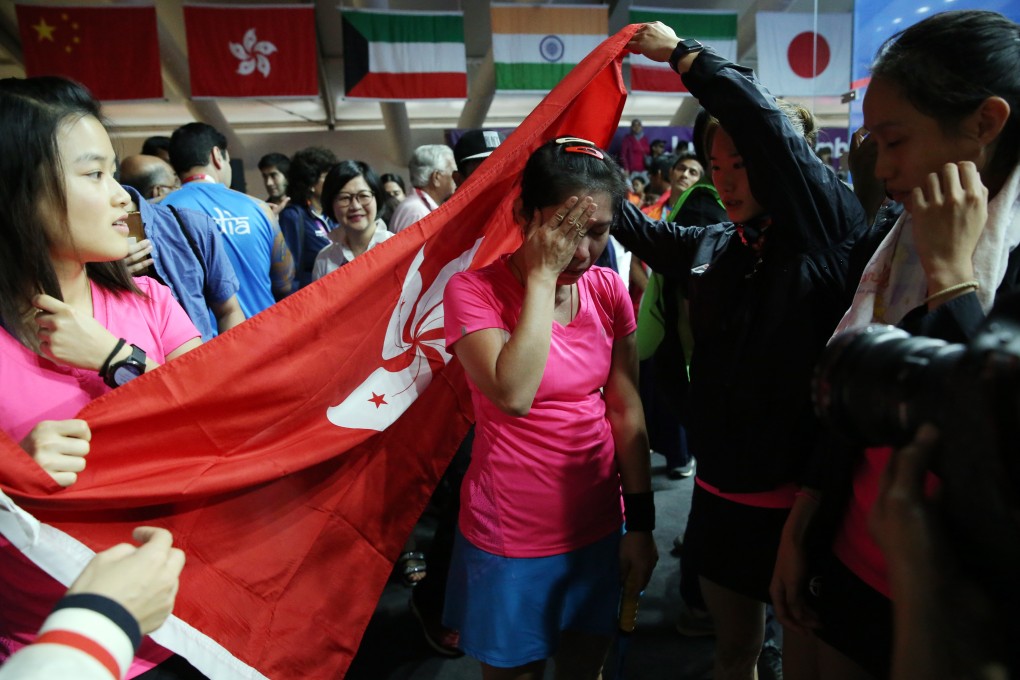 A moment of joy for Hong Kong after winning the women’s team gold at the 2018 Asian Games in Jakarta. From left: Lee Ka-yi, Au, Joey Chan and Ho Tze-lok. Photo: EPA