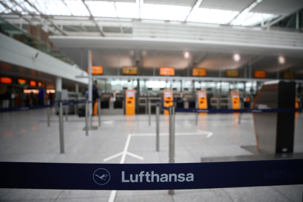 Empty Lufthansa ticket counters are pictured at Munich's international airport, as the spread of the Covid-19 disease continues, on Tuesday. Photo: Reuters