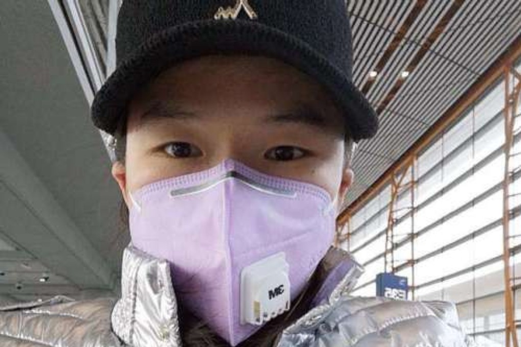 UFC champion Zhang Weili wears a mask at Beijing Airport on her long journey to UFC 248. She remains in Las Vegas. Photo: Weibo/Zhang Weili