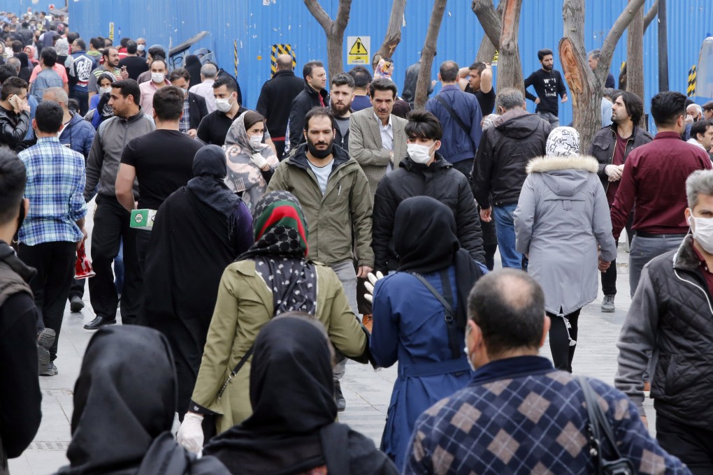 Iranians visit Tehran's grand bazaar on Wednesday despite the government asking people to avoid going out. Photo: EPA-EFE