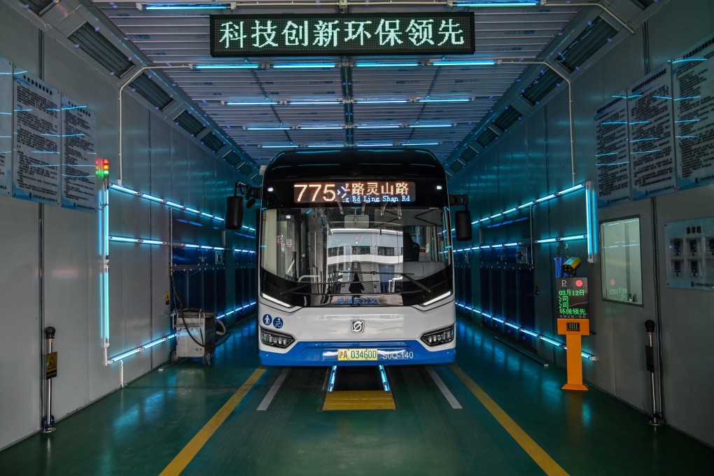 A bus is disinfected with ultraviolet rays in an effort to contain the coronavirus in Shanghai on March 12. Photo: AFP