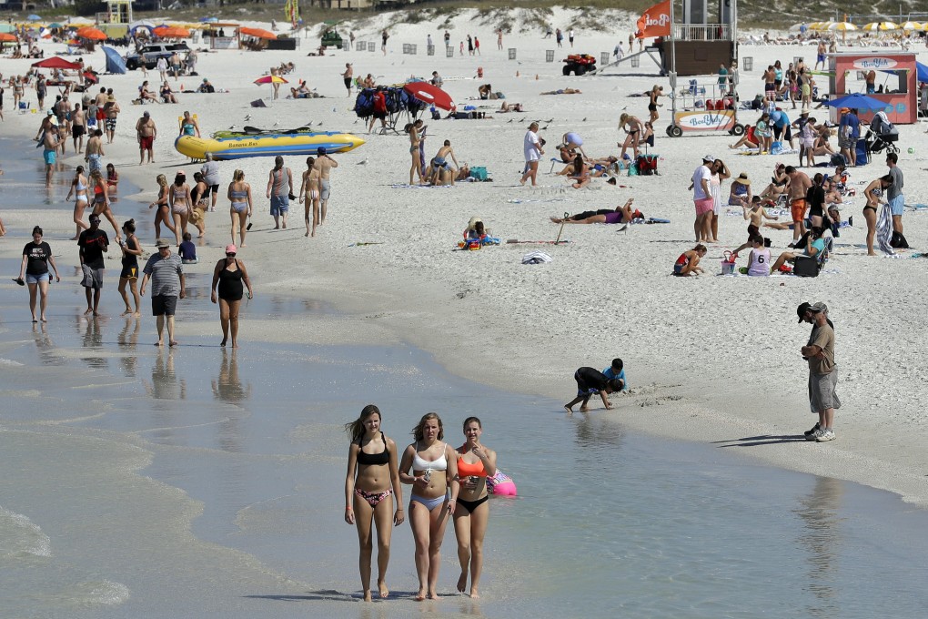 Clearwater Beach, Florida on March 18, 2020. In the US, President Donald Trump urged the country’s young adults to heed social distancing guidelines and avoid ‘gathering on beaches’. Photo: AP