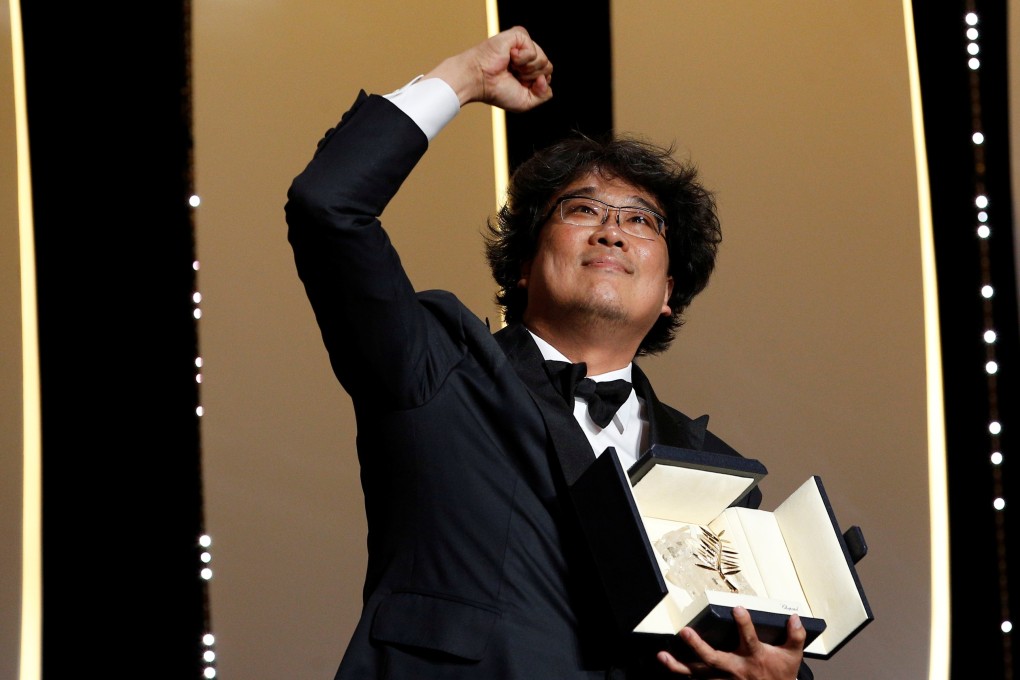 South Korean director Bong Joon-ho celebrates winning the Palme d’Or for his film Parasite at last year’s Cannes Film Festival. This year’s prestigious film event has been postponed. Photo: Reuters