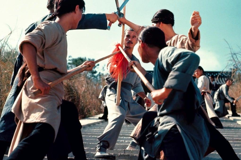 Chen Kuan-tai (centre), as Hong Xi Guan, leader of a small band of monks who escape the destruction of Shaolin Monastery in southern China, in a still from 1977 Shaw Brothers film Executioners from Shaolin.