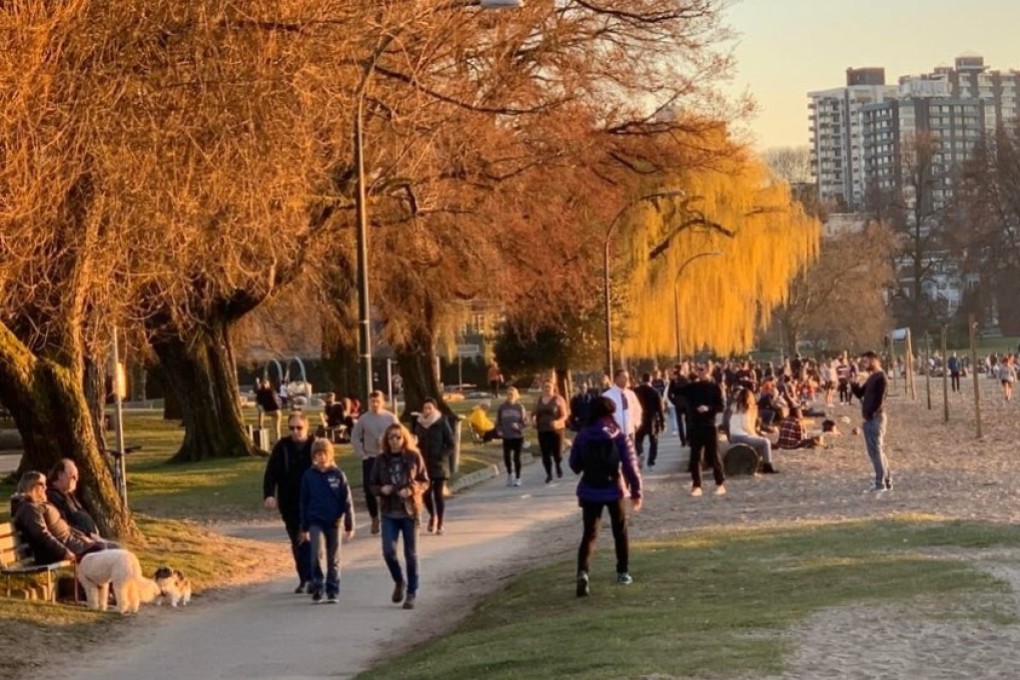 A photo taken at Kitsilano Beach in Vancouver on Wednesday, the day that Vancouver's mayor said he would declare a state of emergency over the Covid-19 pandemic. Photo: Supplied