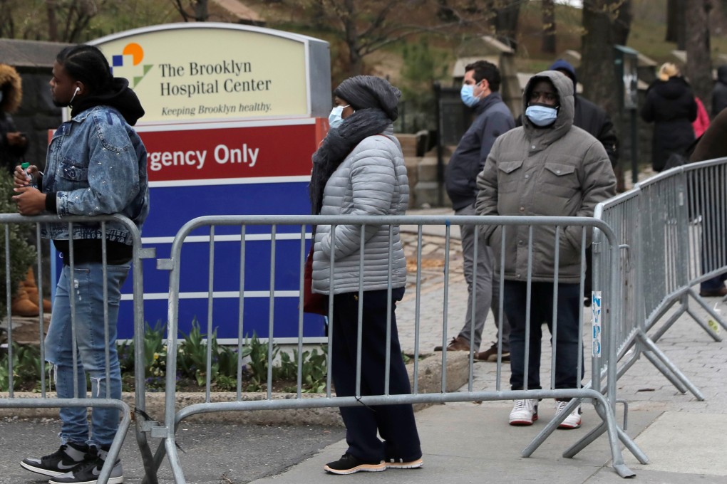 People queue to enter a tent erected to test for the coronavirus at New York’s Brooklyn Hospital Centre. Photo: Reuters