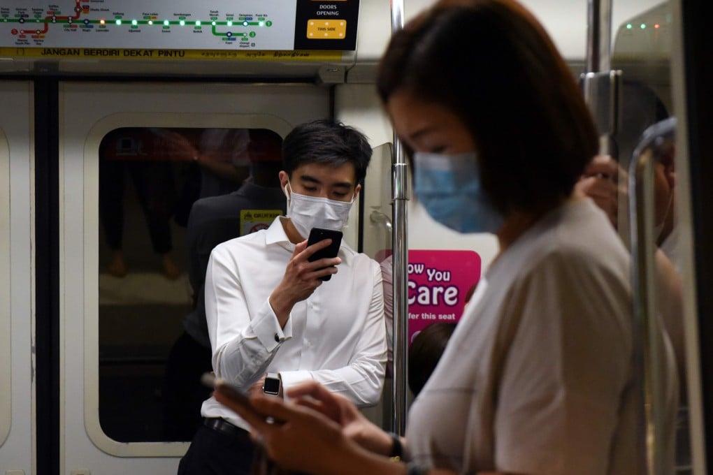 Singaporeans woke on Saturday to news of its first casualties after two patients died. Photo: AFP