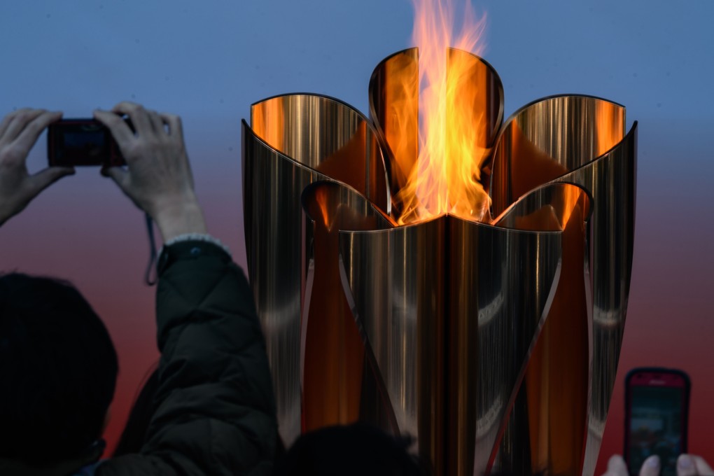 The Tokyo 2020 Olympic flame is displayed outside the Sendai railway station, Miyagi prefecture. Photo: AFP