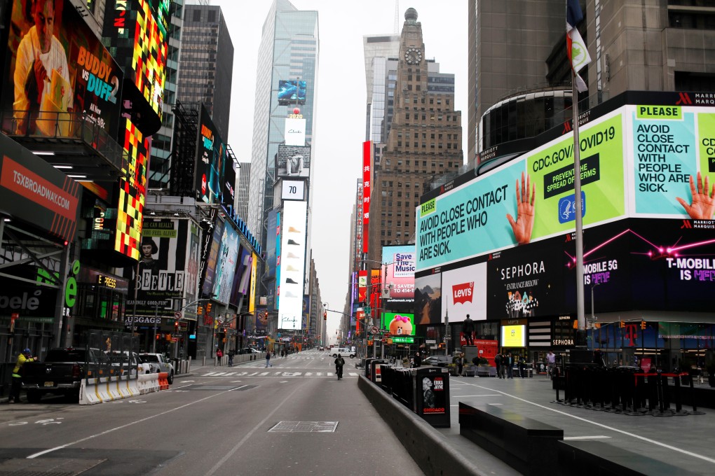 A message about protecting yourself from the coronavirus disease is seen on an electronic hoarding in a nearly empty Times Square in Manhattan in New York City on Friday. Photo: Reuters