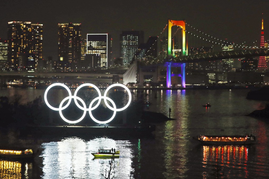 A monument showing the five Olympic rings is lit up at Odaiba Marine Park in Tokyo. Photo: Kyodo