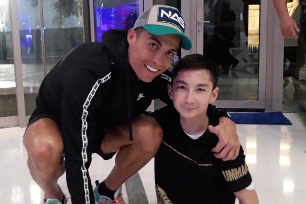 Kazakh swimmer Ali Turganbekov meets Portuguese footballer Cristiano Ronaldo in Dubai last year. Photo: Handout