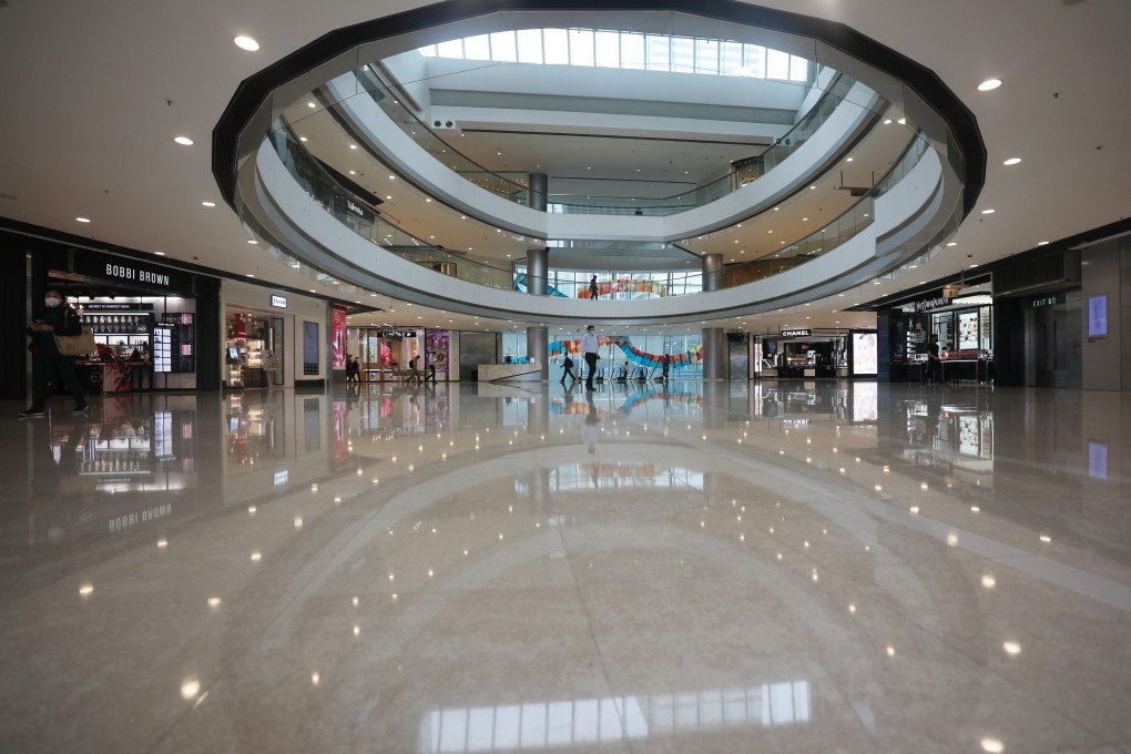 The IFC shopping mall in Central, part-owned by Henderson Land, is almost empty as people stay home amid the coronavirus. Photo: Xiaomei Chen