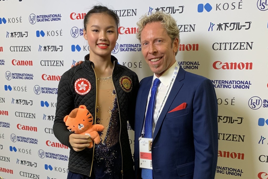 Kahlen Cheung (left) with coach Craig Heath at the 2020 ISU Junior World Figure Skating Championship. Photo: Handout