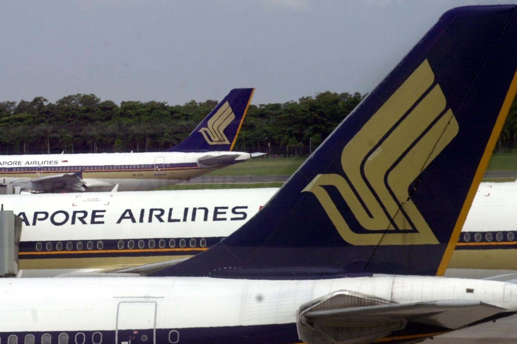 Singapore Airlines planes on the tarmac at Changi Airport. Photo: AFP