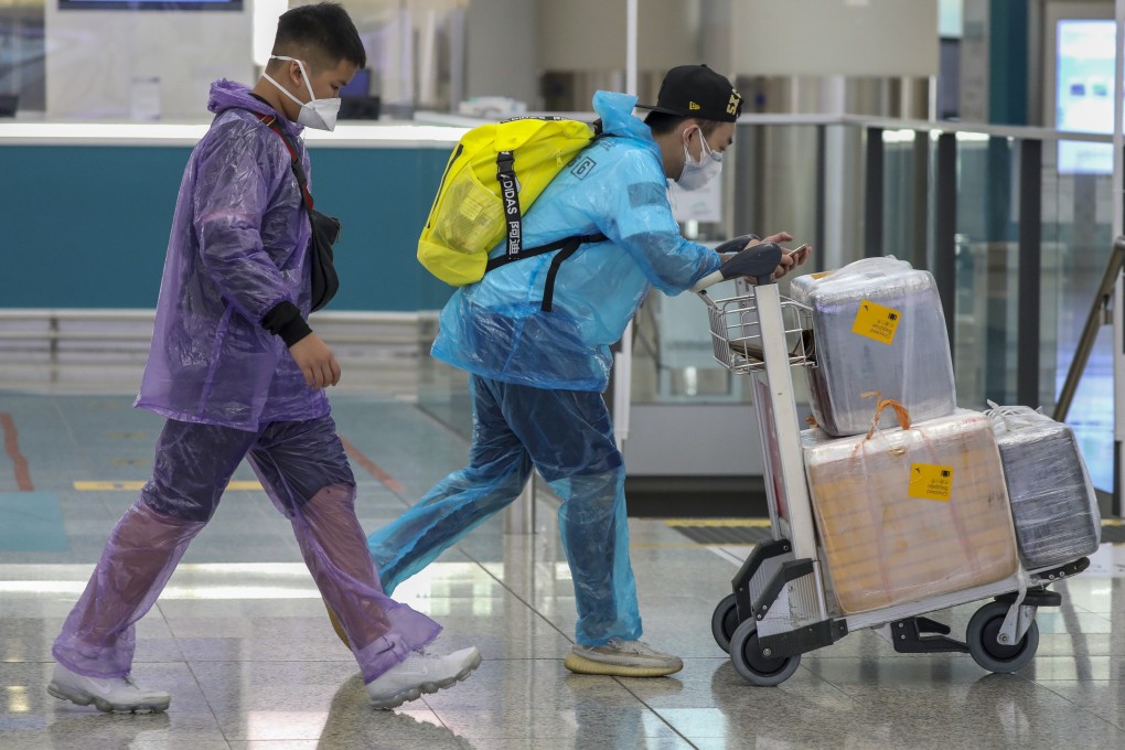 Travellers arrive at Hong Kong International Airport amid the coronavirus outbreak. Photo: Nora Tam