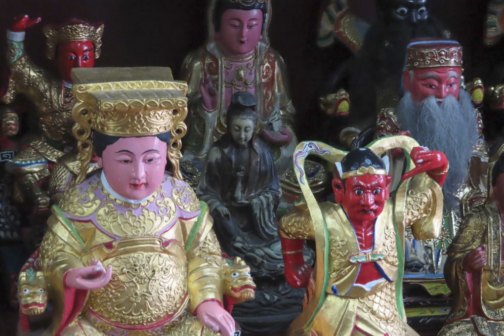 Statues of deities at Say Tian Hng, in Singapore. Photo: David Leffman