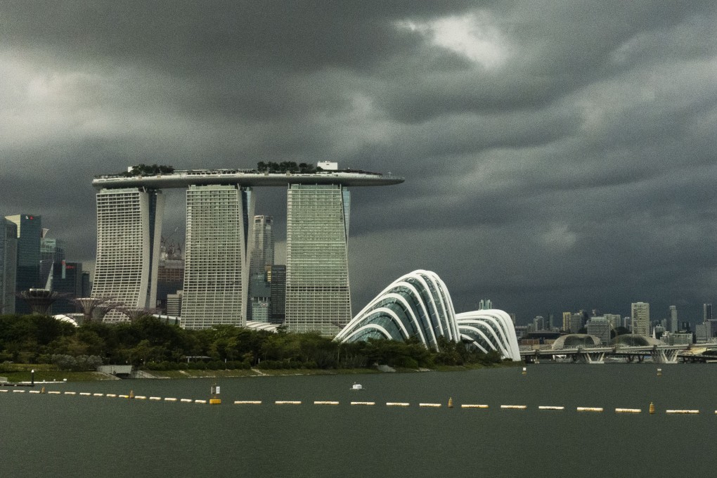 Dark clouds loom above the Singapore’s skyline on February 10. Photo: Xinhua