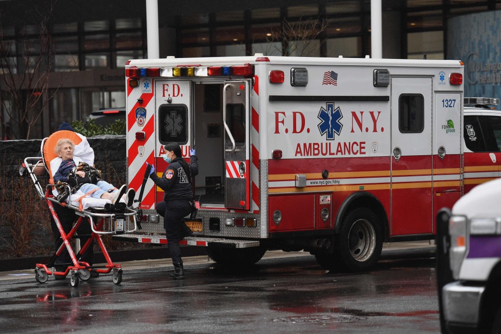 An elderly person arrives on a stretcher at NYU Langone Health Centre hospital in New York City on Monday. Anxiety ratcheted up across New York, the epicentre of America's coronavirus outbreak. Photo: AFP
