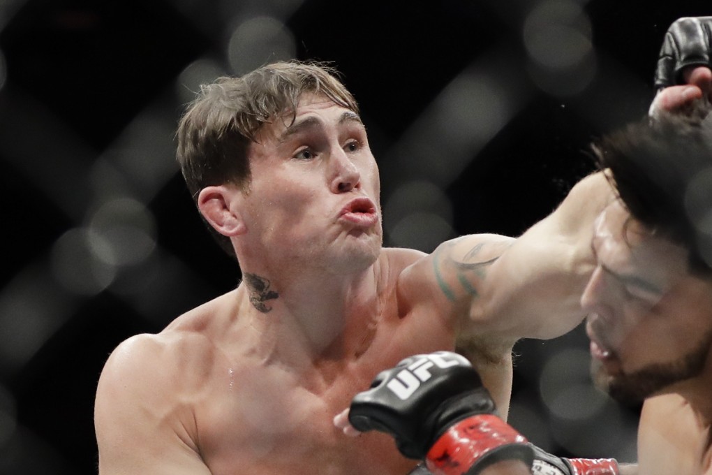 Britain's Darren Till punches Kelvin Gastelum during his split decision win at UFC 244 in November last year. Photo: AP