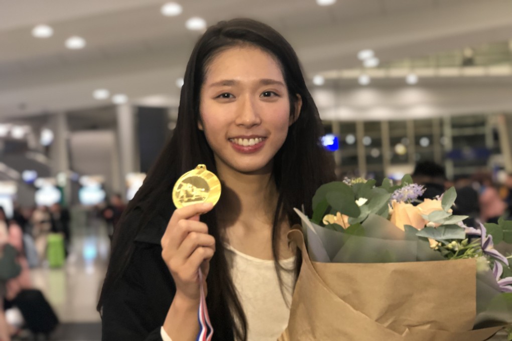 Fencer Vivian Kong Man-wai shows off the gold medal she won at a World Cup event in Havana, Cuba in 2019. Photo: Chan Kin-wa