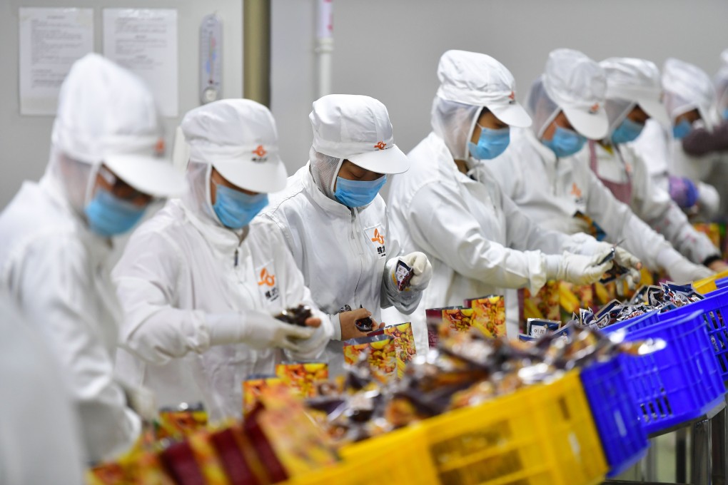 Workers pack instant river snail rice noodles at a factory in Liuzhou, south China's Guangxi Zhuang Autonomous Region, Jan. 2, 2020. Photo: Xinhua