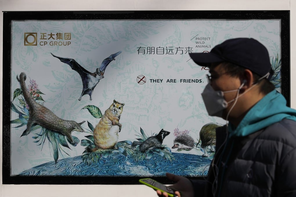 A poster urging the public to protect wildlife, in Beijing, in March. Photo: AP