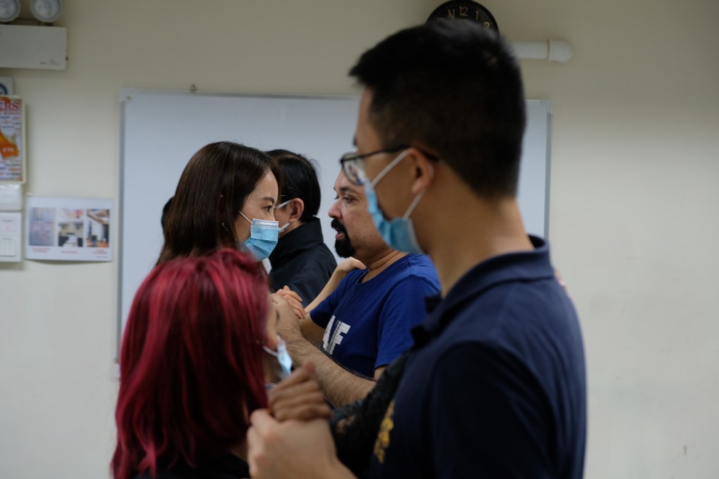 Salsa students wear face masks when dancing close together at Javed Rasool’s dance school in Hong Kong. Photo: Albert Han