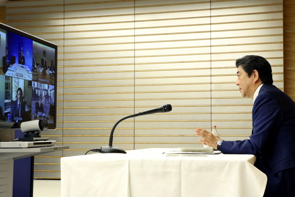 Japan’s Prime Minister Shinzo Abe attends a video conference with other G7 leaders from at his official Tokyo residence on March 16. Photo: Reuters