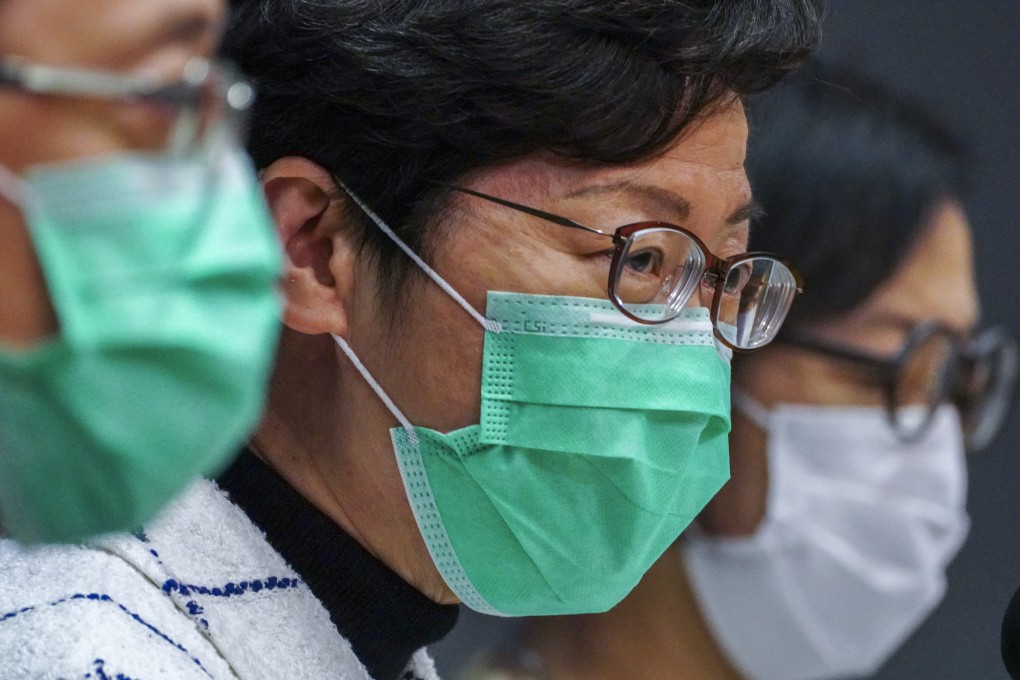 Chief Executive Carrie Lam Cheng Yuet-ngor (centre) speaks at a press briefing on March 23, announcing new measures to help Hong Kong contain the spread of the coronavirus. Photo: Robert Ng