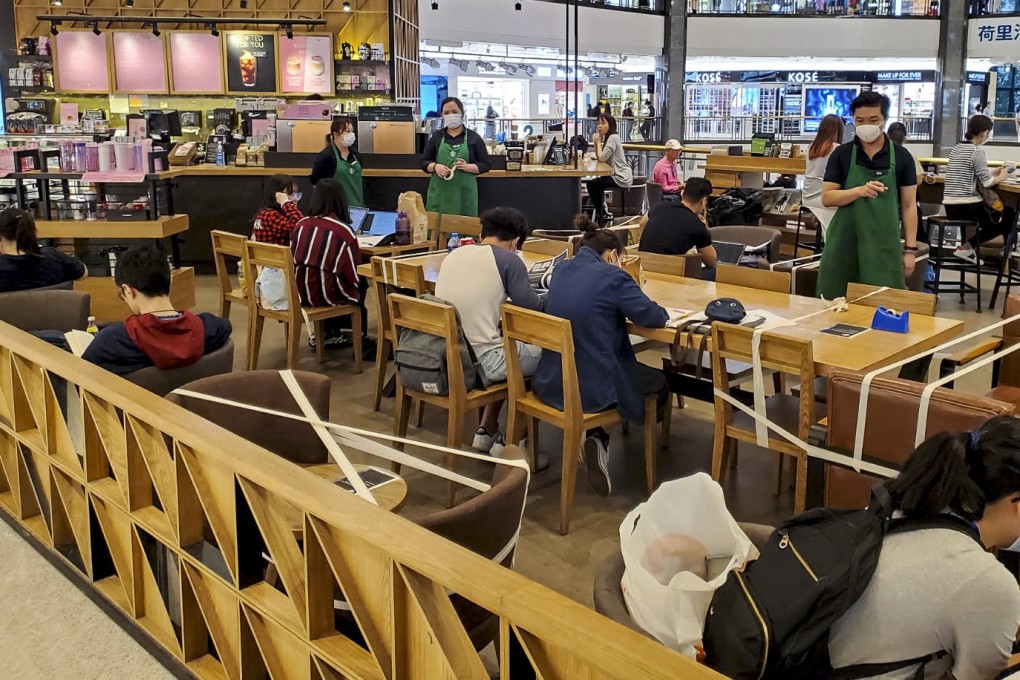 A branch of Starbucks in Diamond Hill enforces social distancing among its customers. Photo: Jimmy Cheung