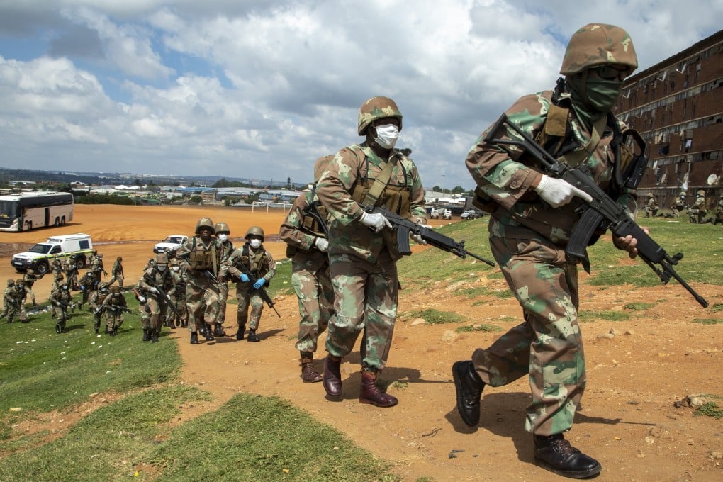 South African National Defence Forces pictured enforcing the country’s coronavirus lockdown in Johannesburg on Saturday. Photo: AP