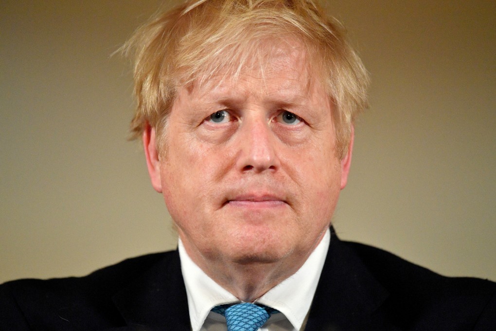 British Prime Minister Boris Johnson during a Covid-19 news conference inside 10 Downing Street in London on March 19. Photo: Reuters