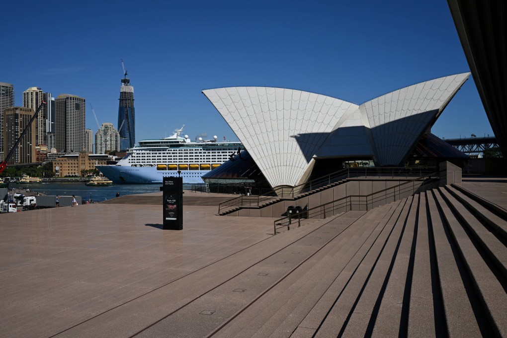 The mostly deserted steps of the Sydney Opera House, where scheduled public performances have been cancelled due to the coronavirus. Photo: Reuters