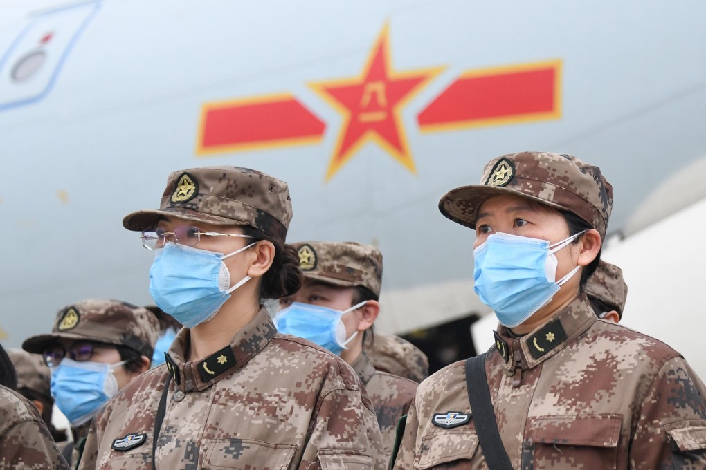 Chinese military medical staff in Wuhan, Hubei Province, wear masks to guard against the coronavirus. Photo: Xinhua