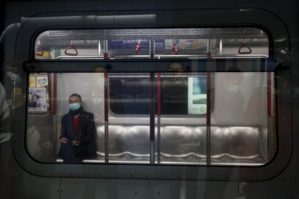 A man wears a face mask on a train at Causeway Bay MTR station, in Hong Kong, in February. Photo: SCMP / Nora Tam