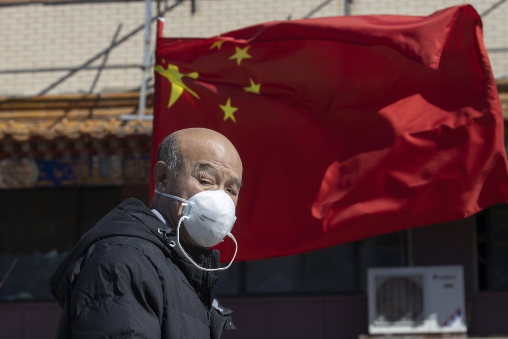 China wants to curb the number of new cases coming into China with a temporary ban on foreigners, including those with a Chinese visa. Photo: AP Photo