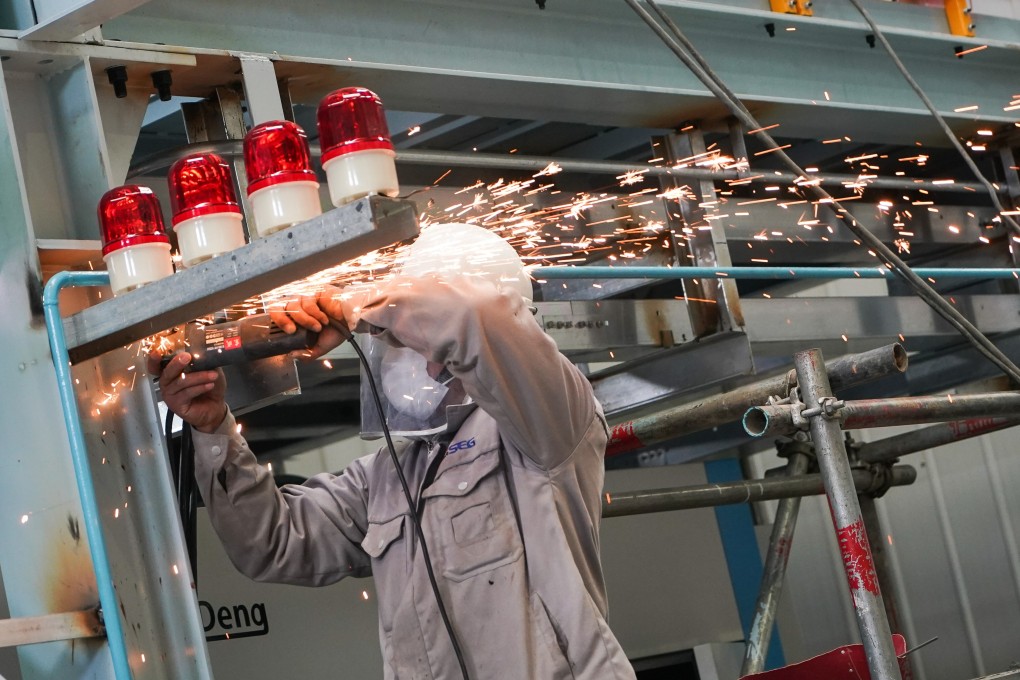 China’s official manufacturing PMI in March was 52, bouncing back from an all-time low in the first two months of the year. Photo: Xinhua