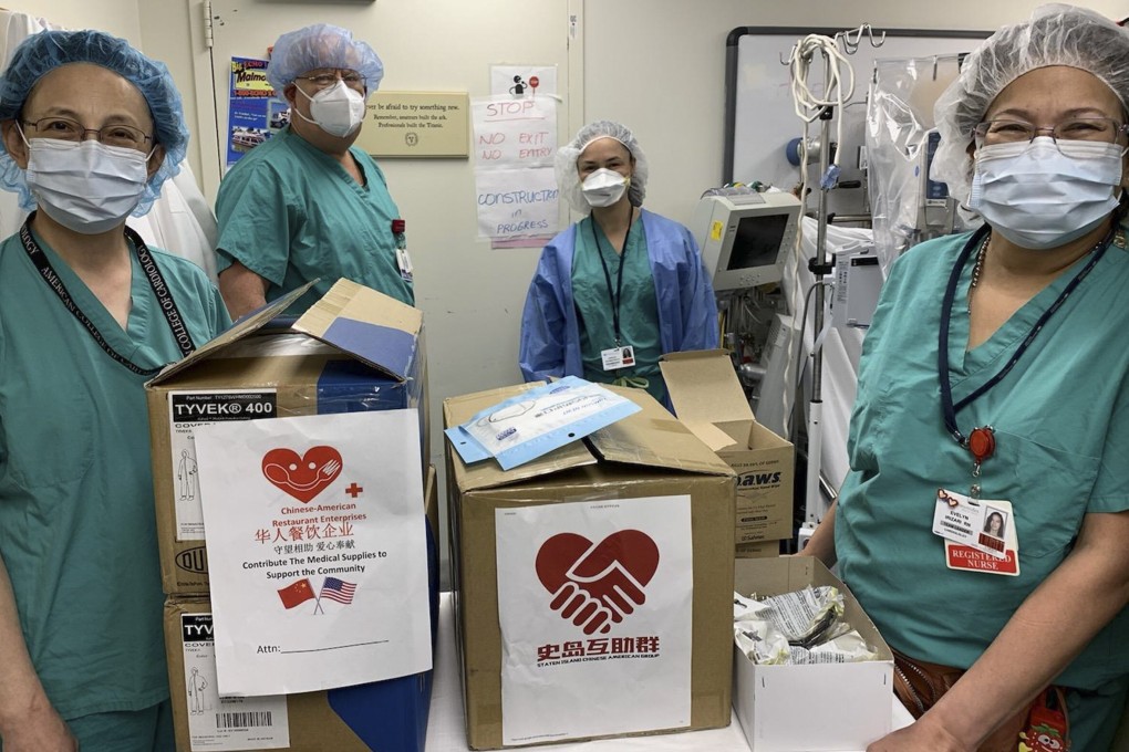 Medical workers at a Staten Island hospital in New York receive face masks donated by the Chinese community in the US and their counterparts in China. Photo: Xinhua