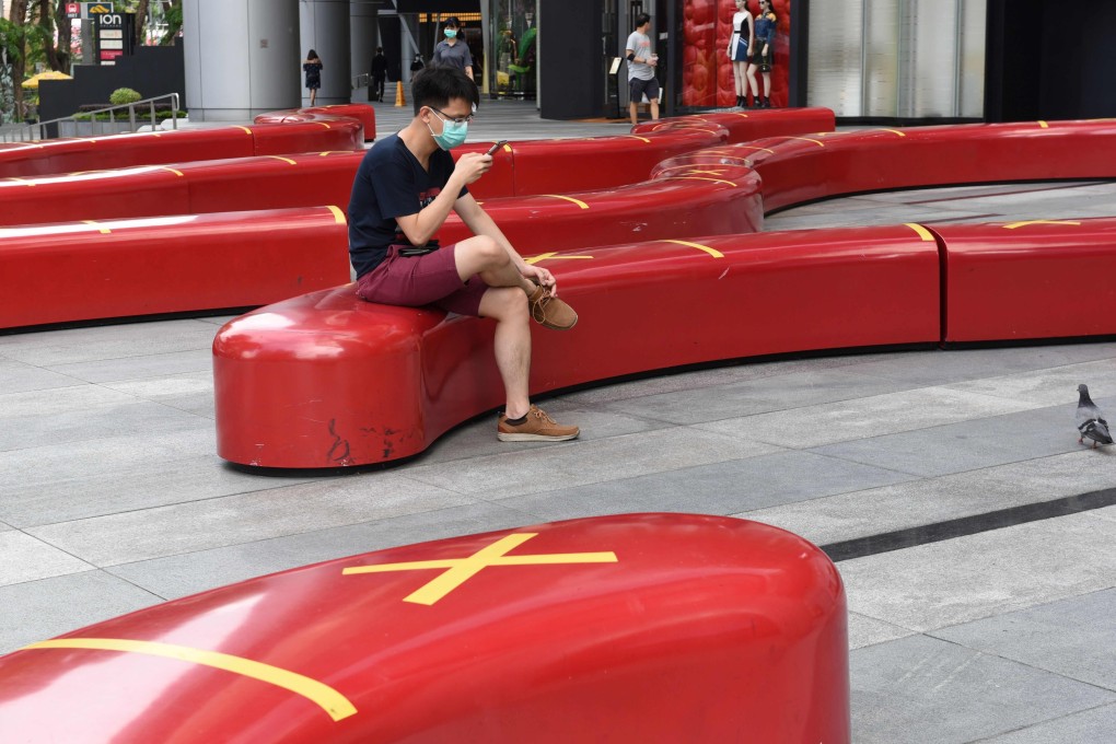 A man wearing a face mask as a preventive measure against coronavirus in Singapore. Photo: AFP